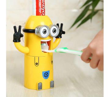 Minion toothpaste dispenser and brush holder 